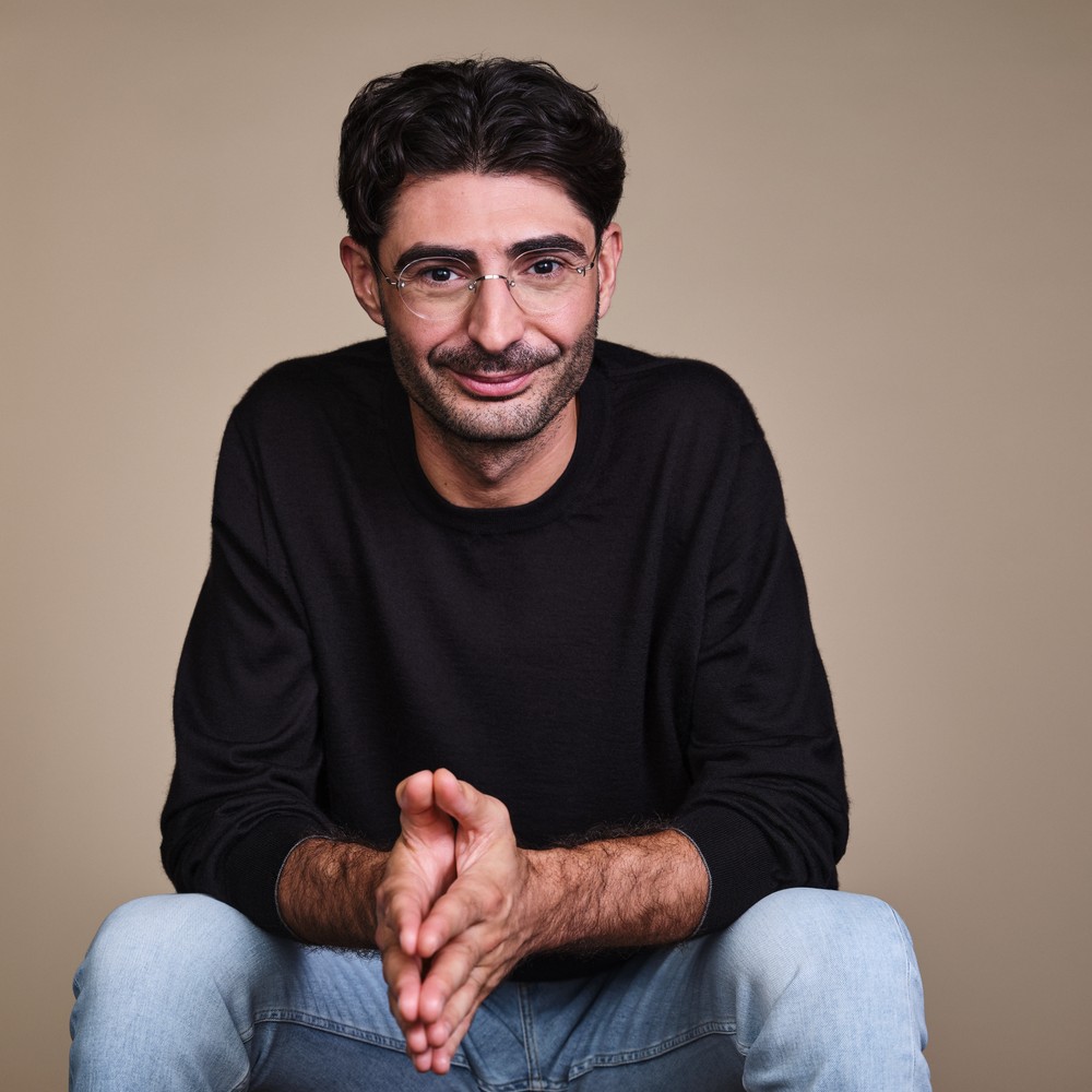 Lee Hnetinka, CEO of FutureAI, studio portrait 2026